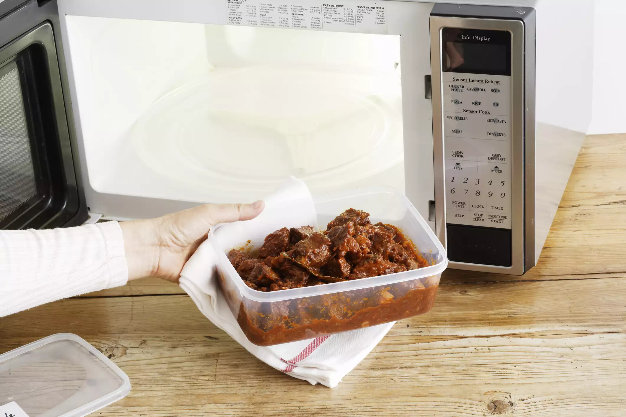 Heating leftover in a microwave in a plastic container