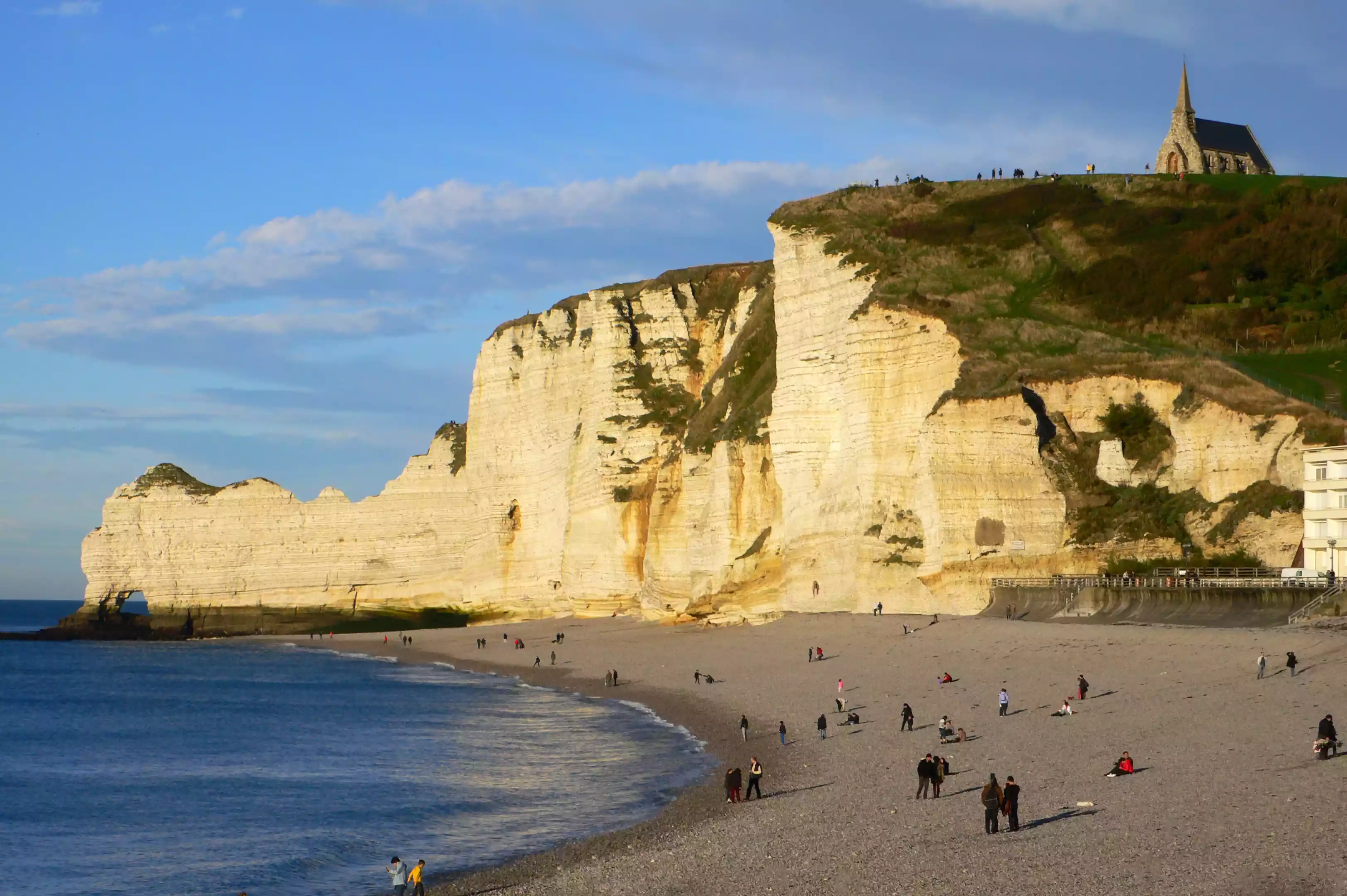 The white face of the cliffs at Étretat, France on a sunny day