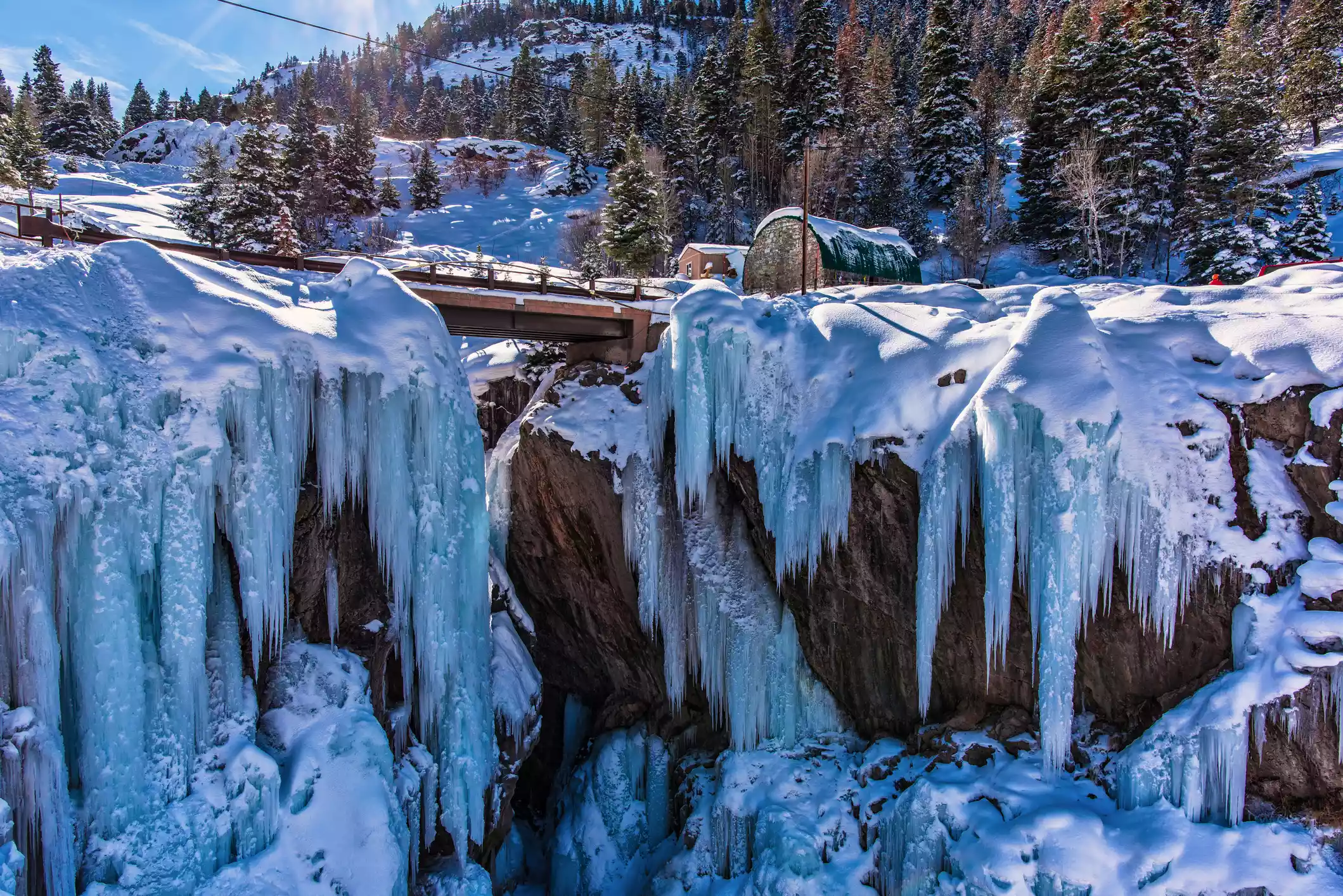 Footbridge between two ice-covered cliffs in Ouray
