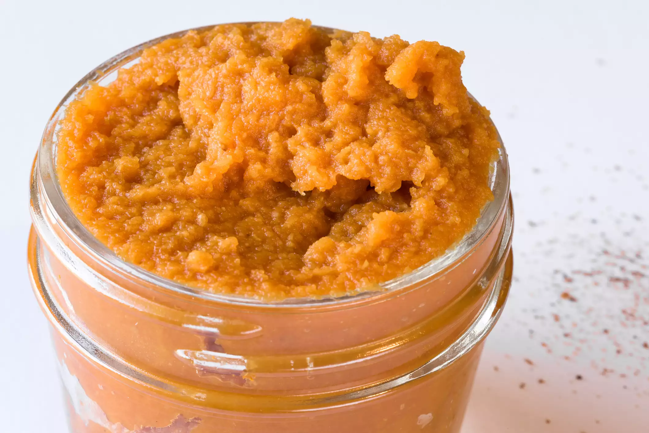 Pumpkin pureed in a glass jar.