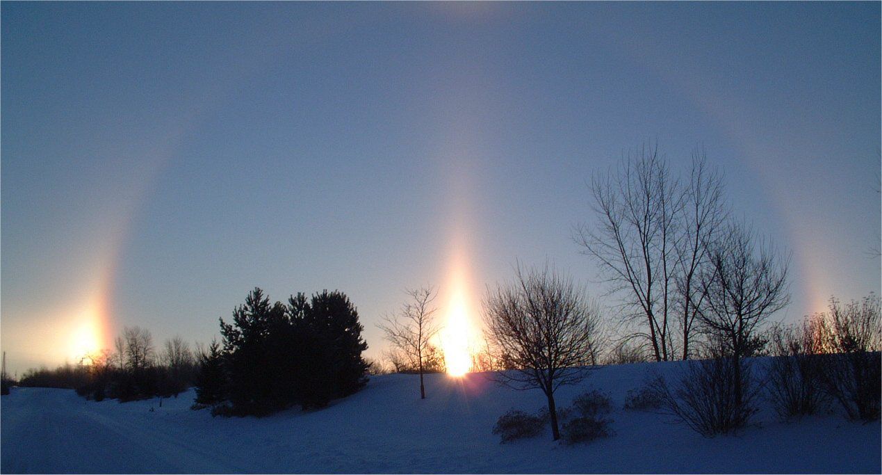 Sol naciente y halos de hielo cerca de Green Bay, Wisconsin
