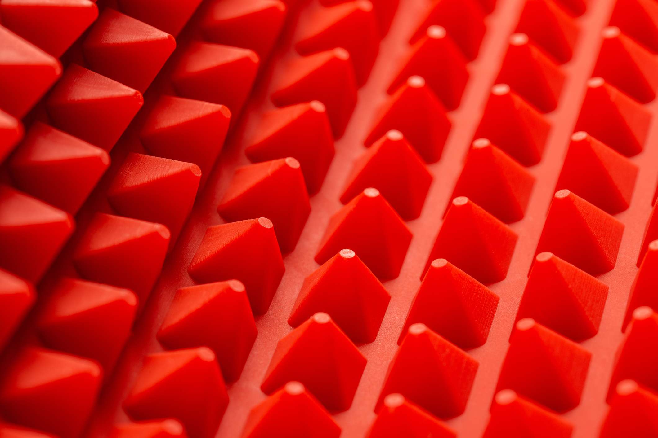fondo abstracto de pirámides de silicona roja